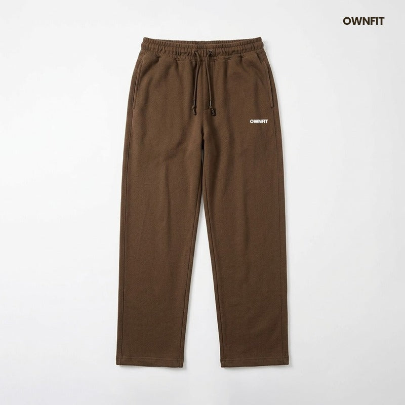 tracksuit white T shirt brown trouser